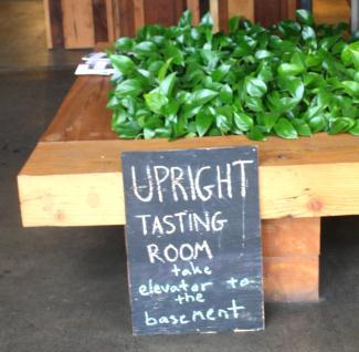 upright 2 sign to tasting room